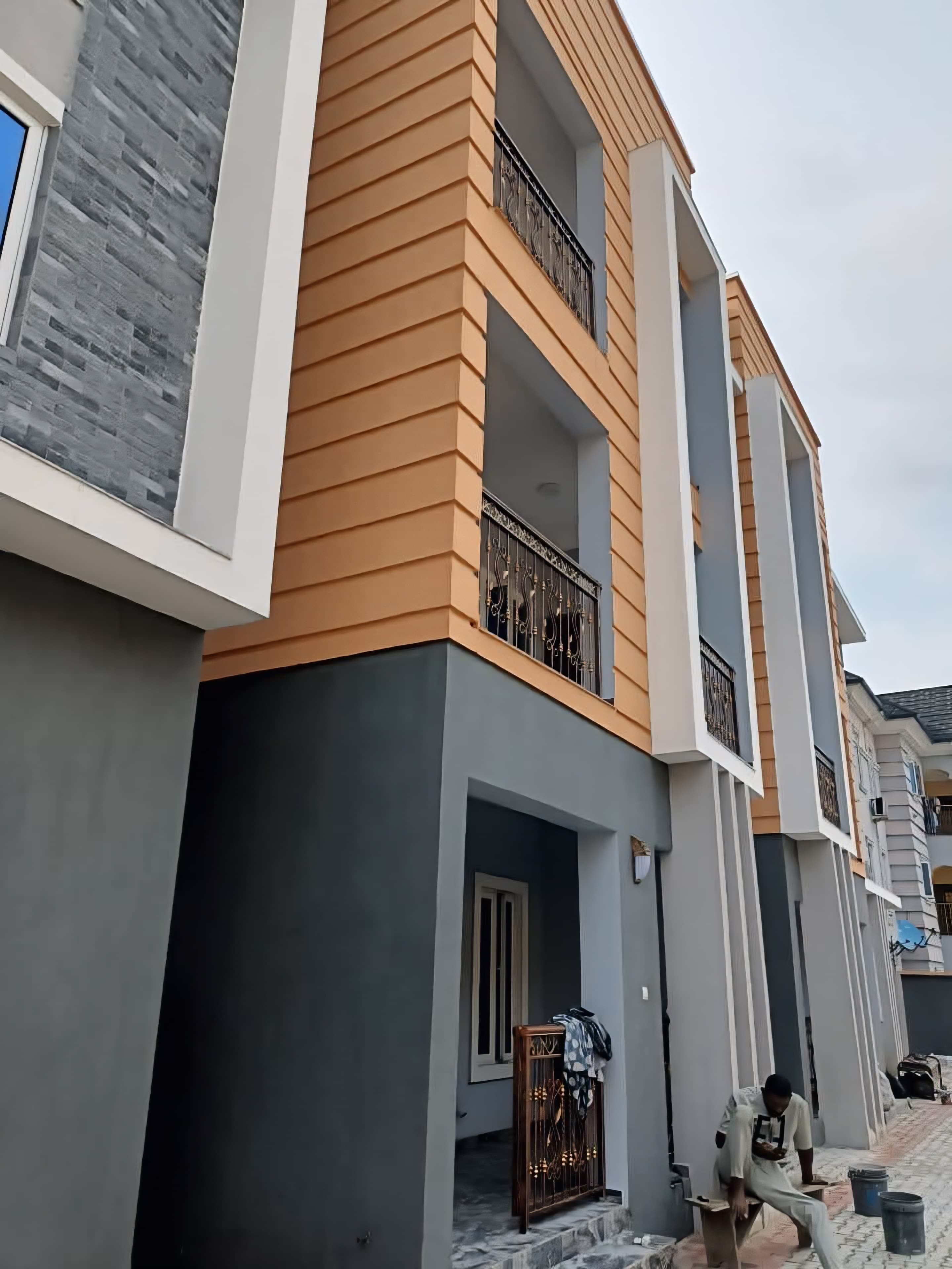 Modern architectural building at dusk — Azariah Arch About Us